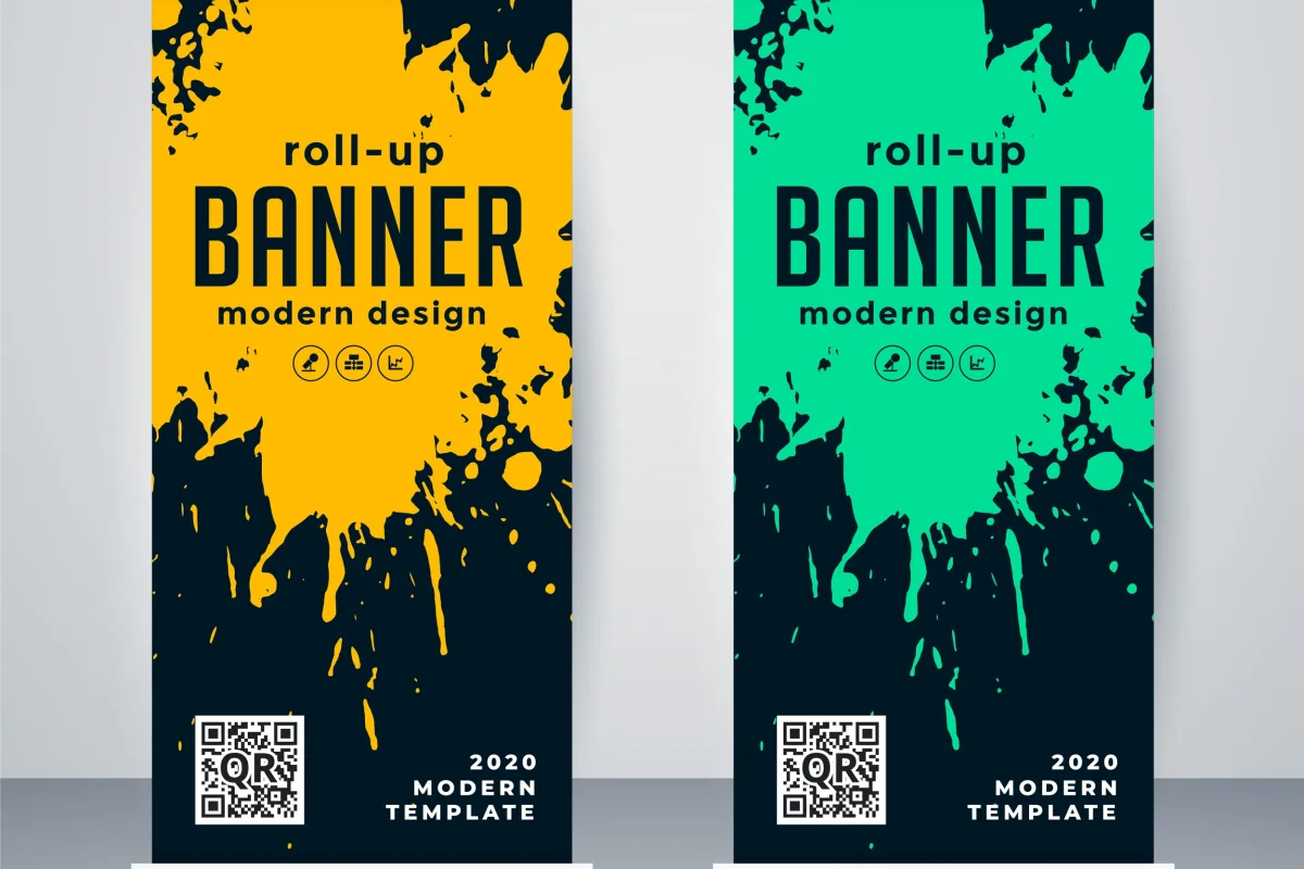Dos roll up banner con diseño moderno, destacando manchas de pintura en tonos amarillo y verde sobre un fondo oscuro, para captar la atención en eventos.